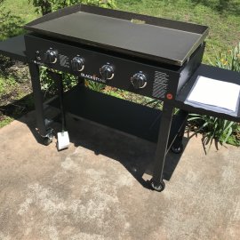 4-Burner Propane Gas Grill in Black with Griddle Top Assembly